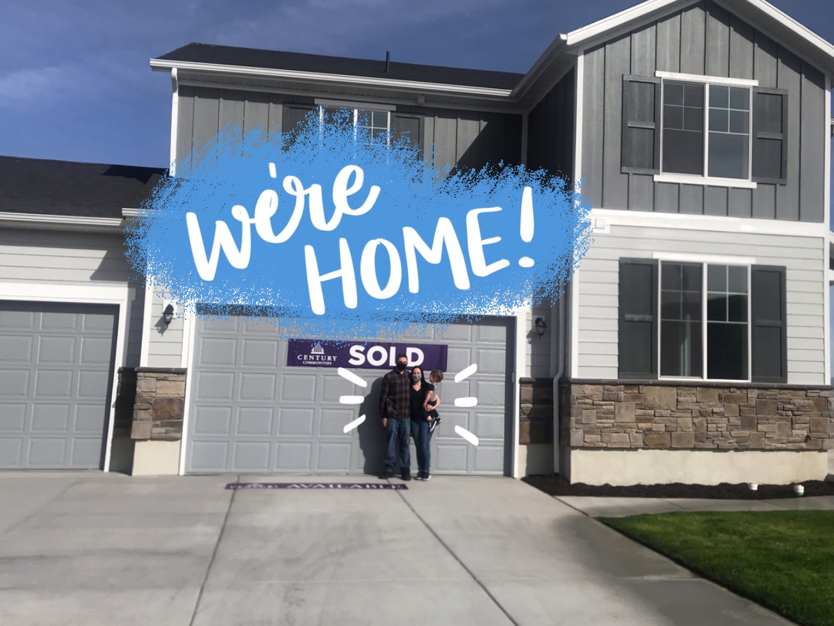 A group of people standing outside a building.