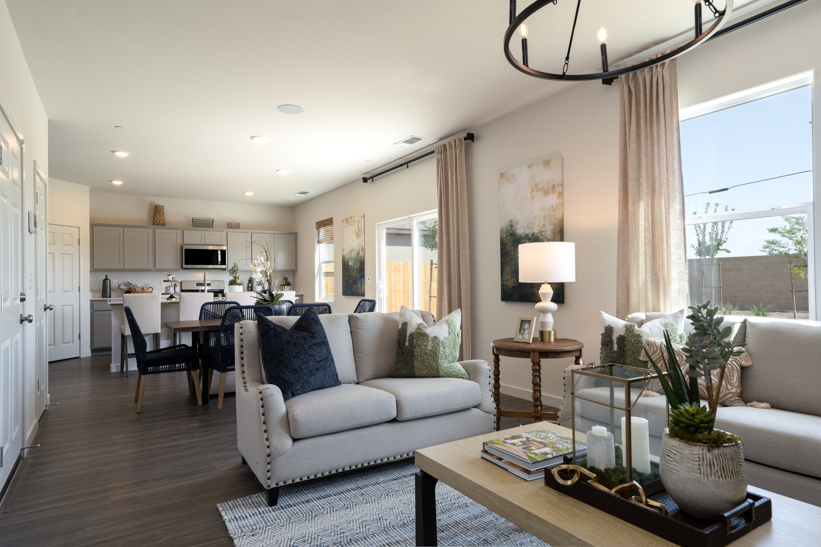 A living room with a large window.
