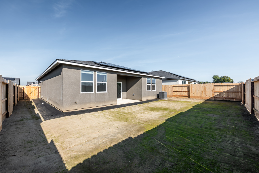 A house with a fence around it.