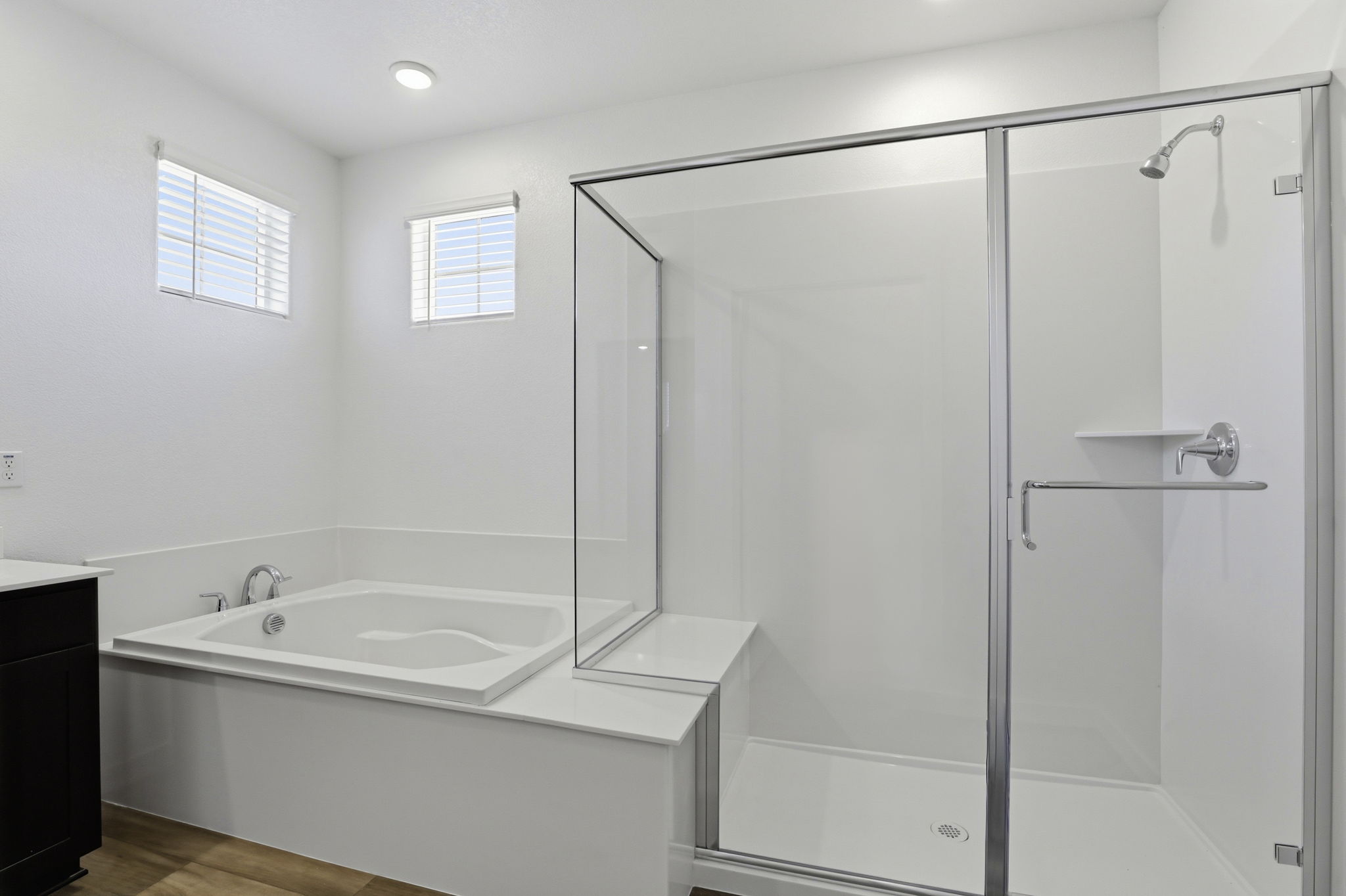 A bathroom with a glass shower.