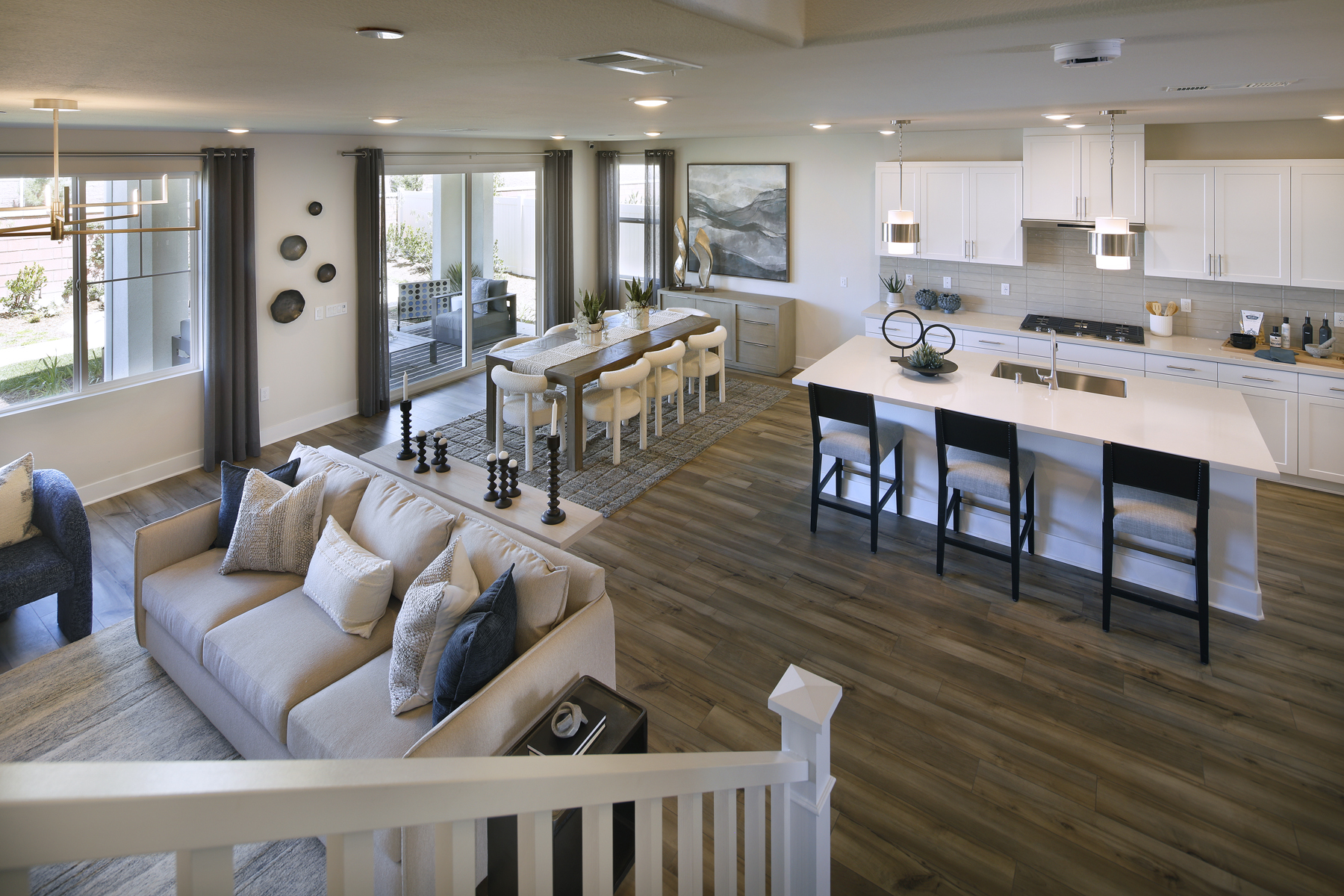 A large living room with a large kitchen and dining area.
