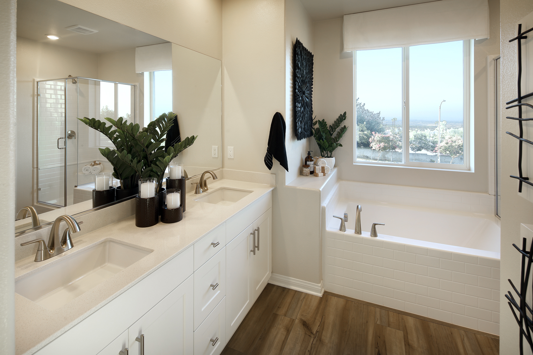 A bathroom with a sink and a mirror.