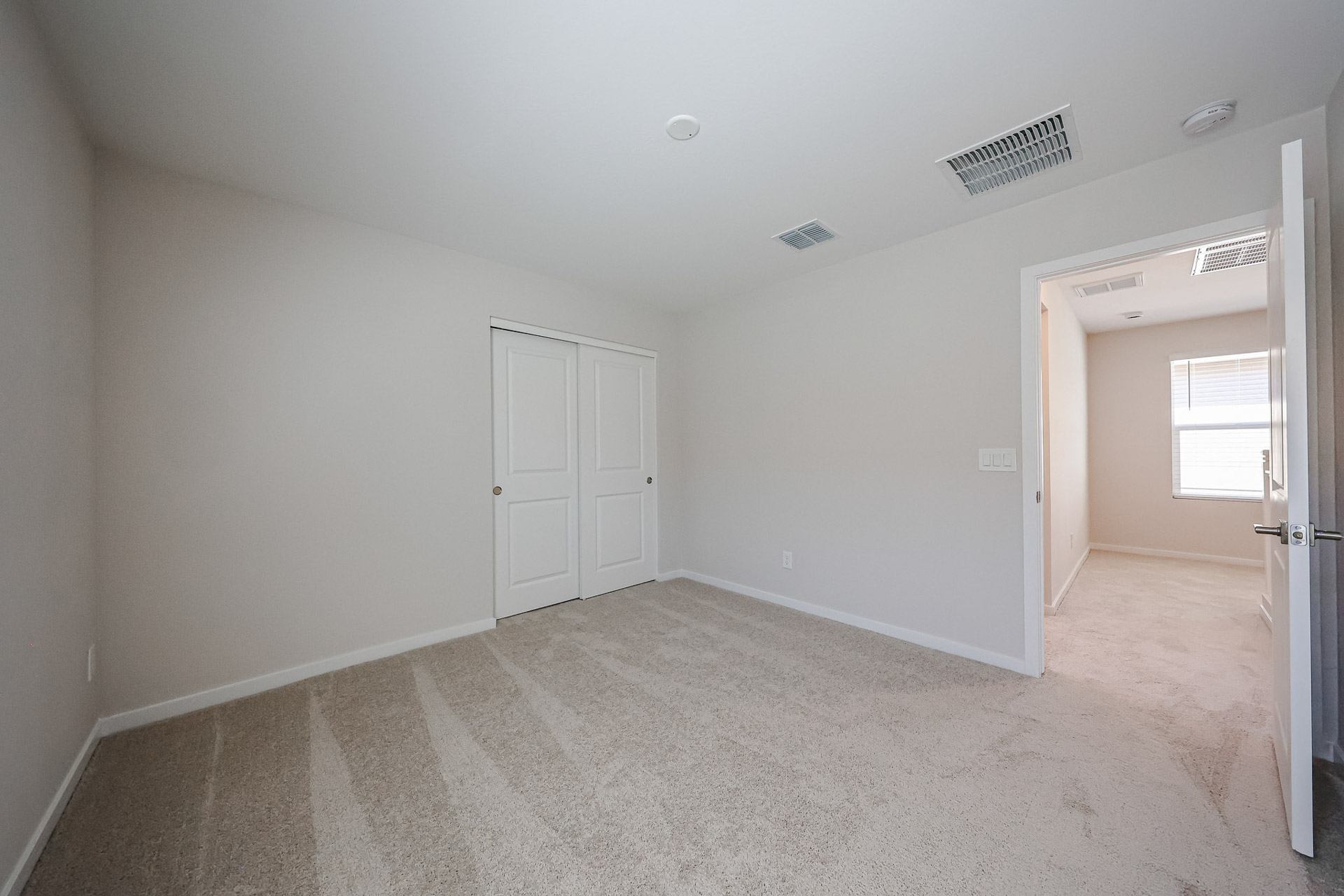 A room with white doors.