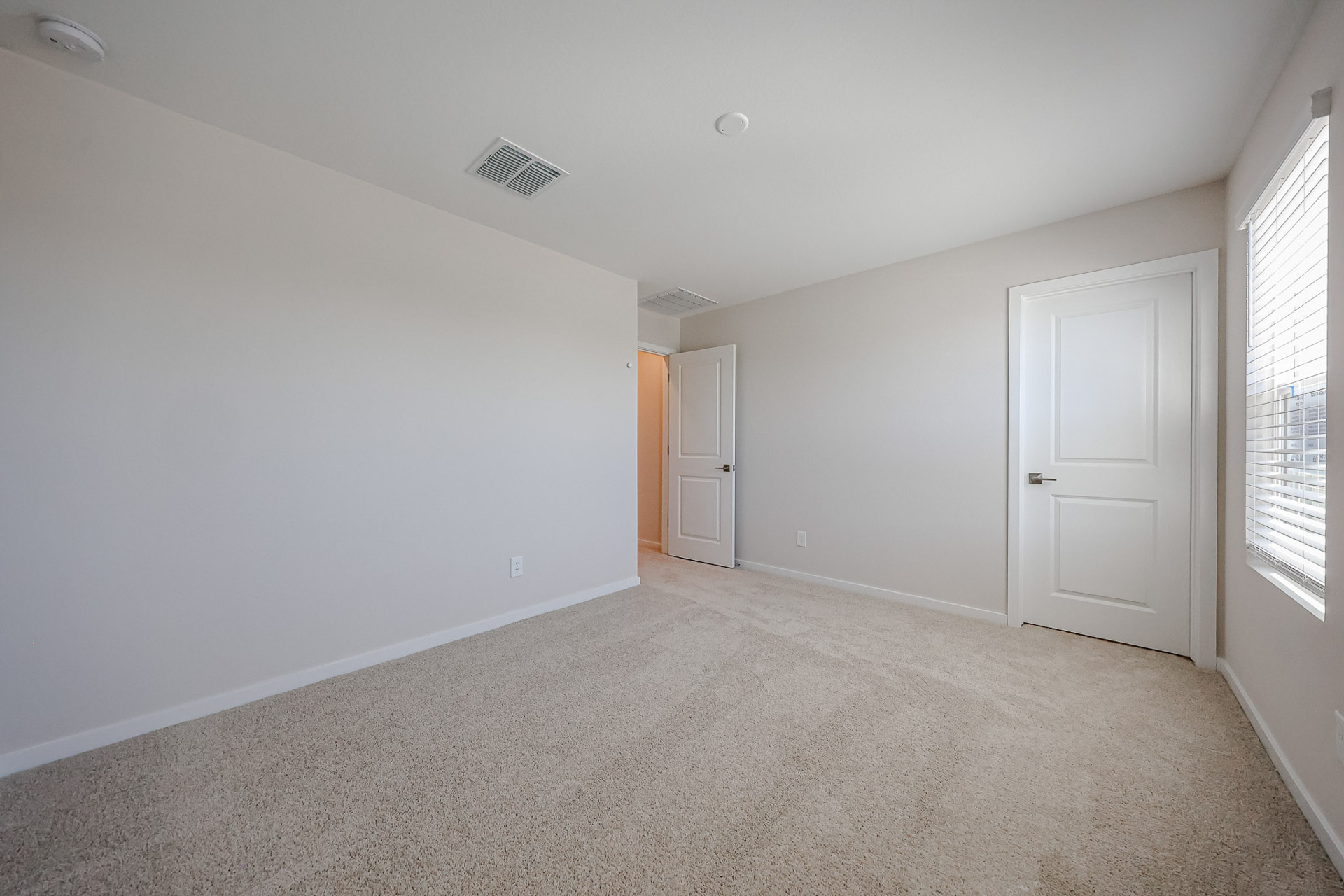 A room with white doors.