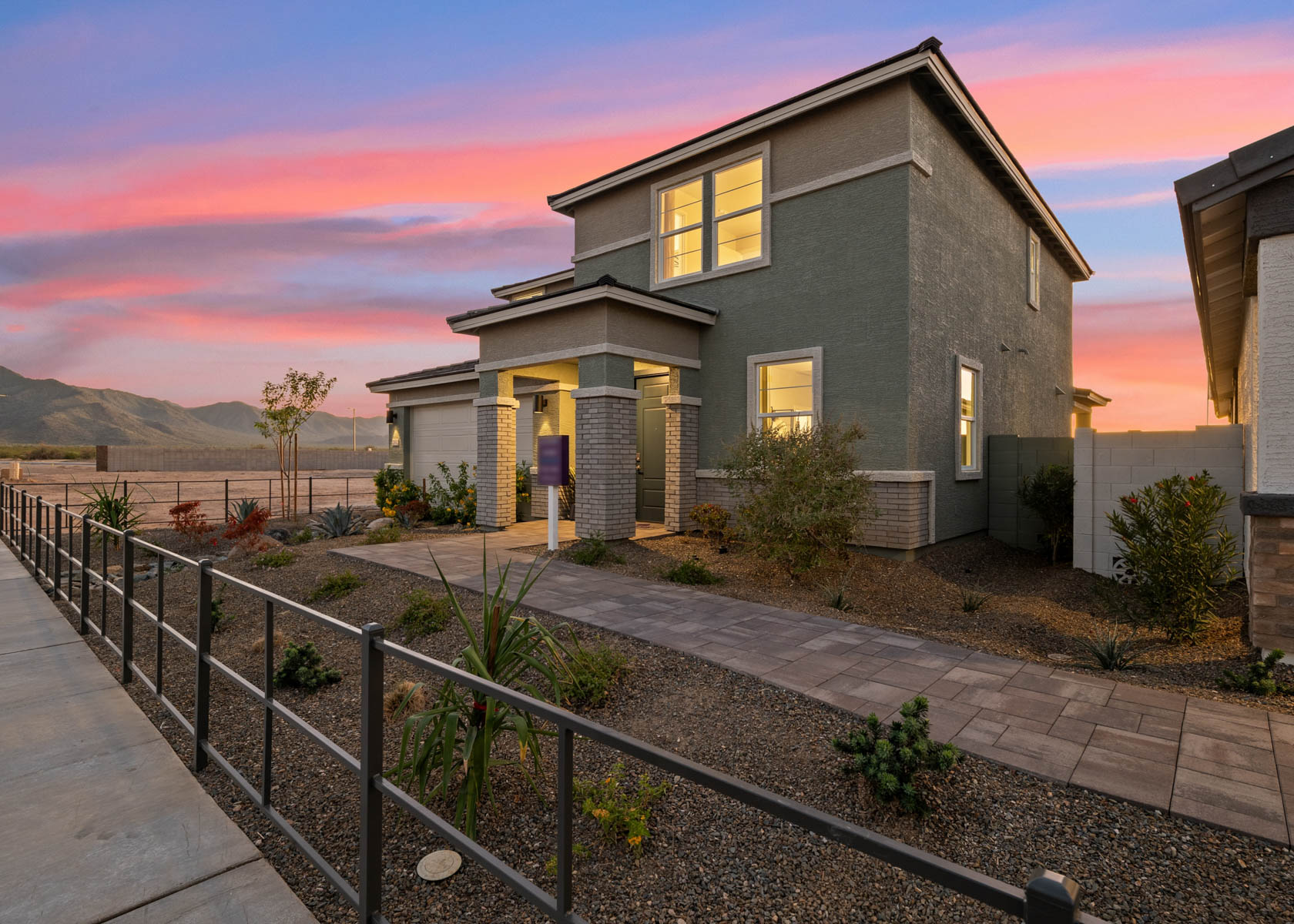 A house with a fence around it.