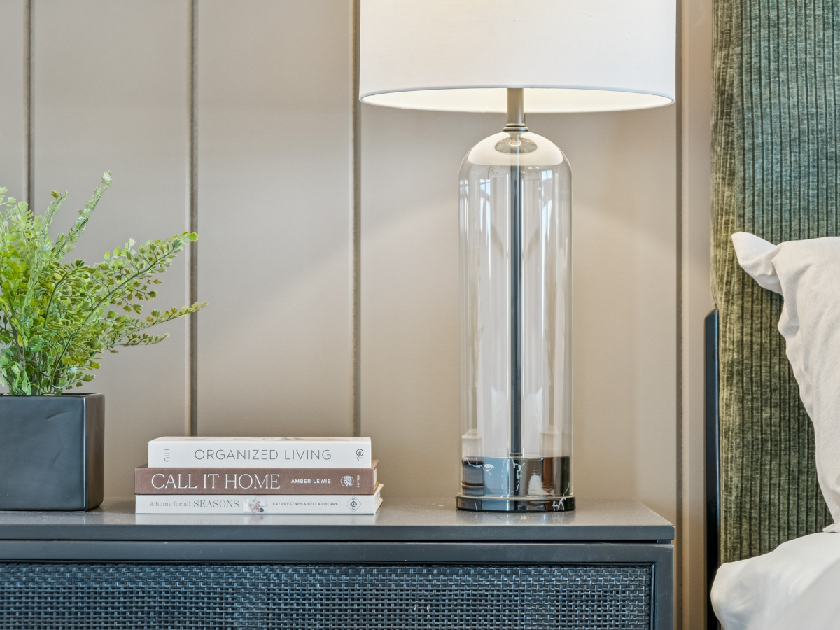 A glass lamp on a table.