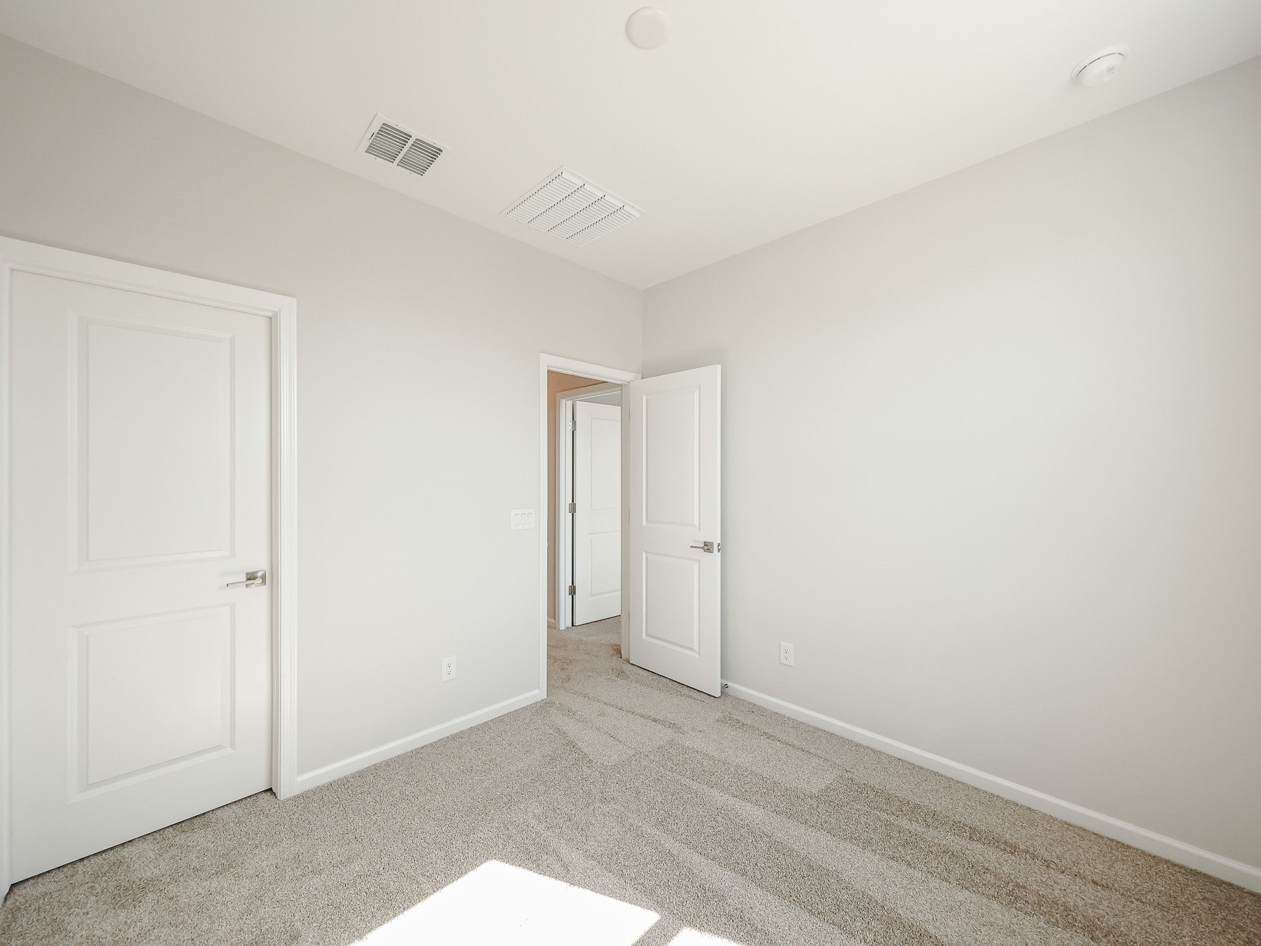 A room with white doors.