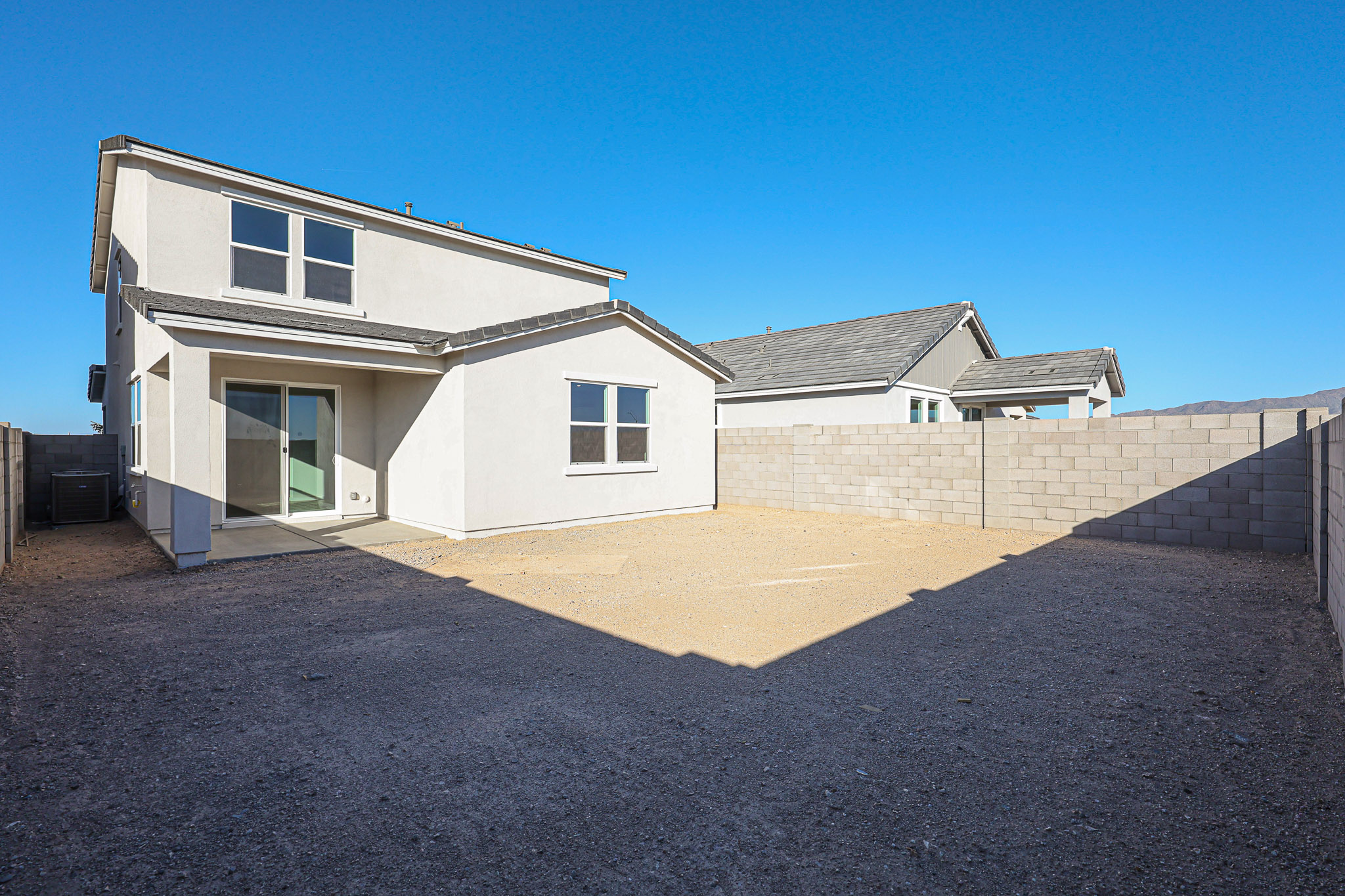 A house with a brick wall.
