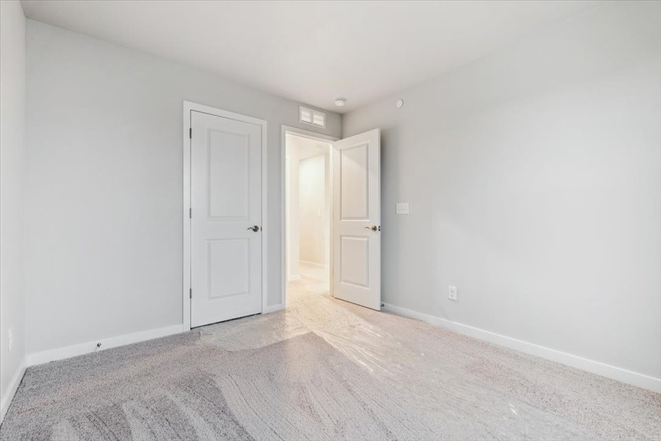 A room with white doors.