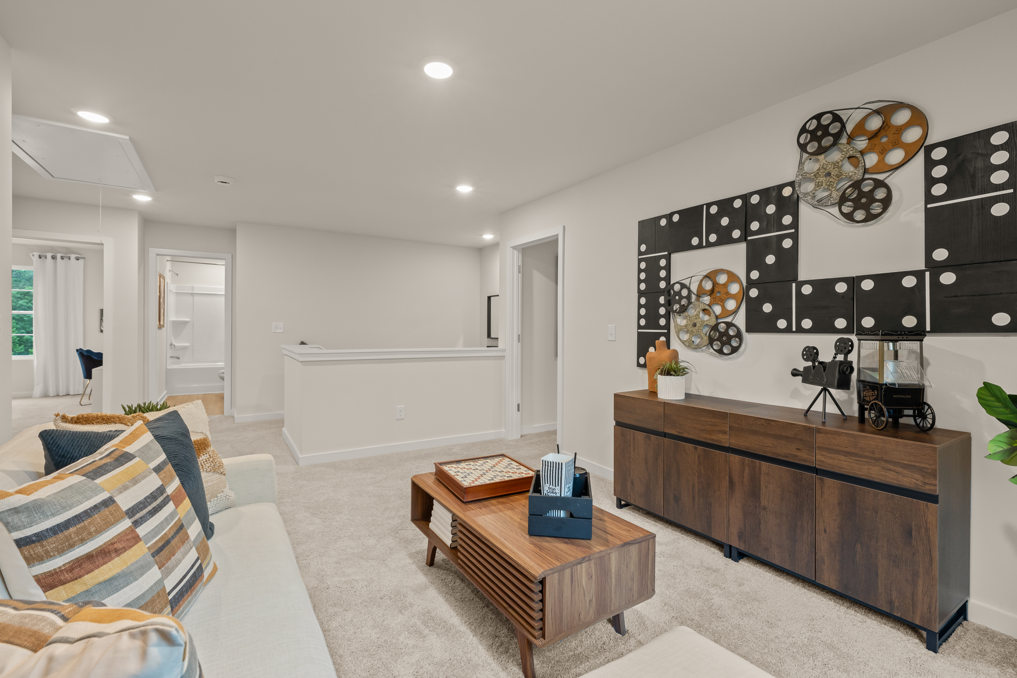 A living room with a couch and a coffee table.