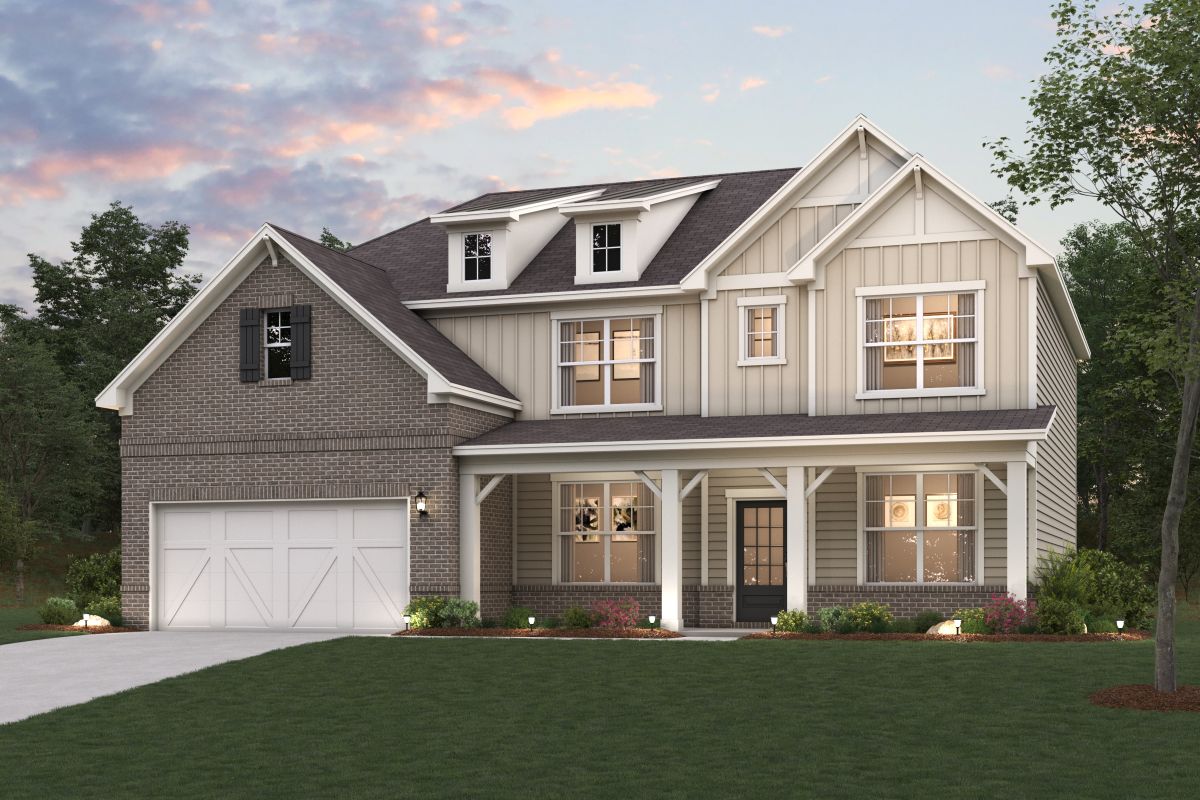 A house with a lawn in front of it.