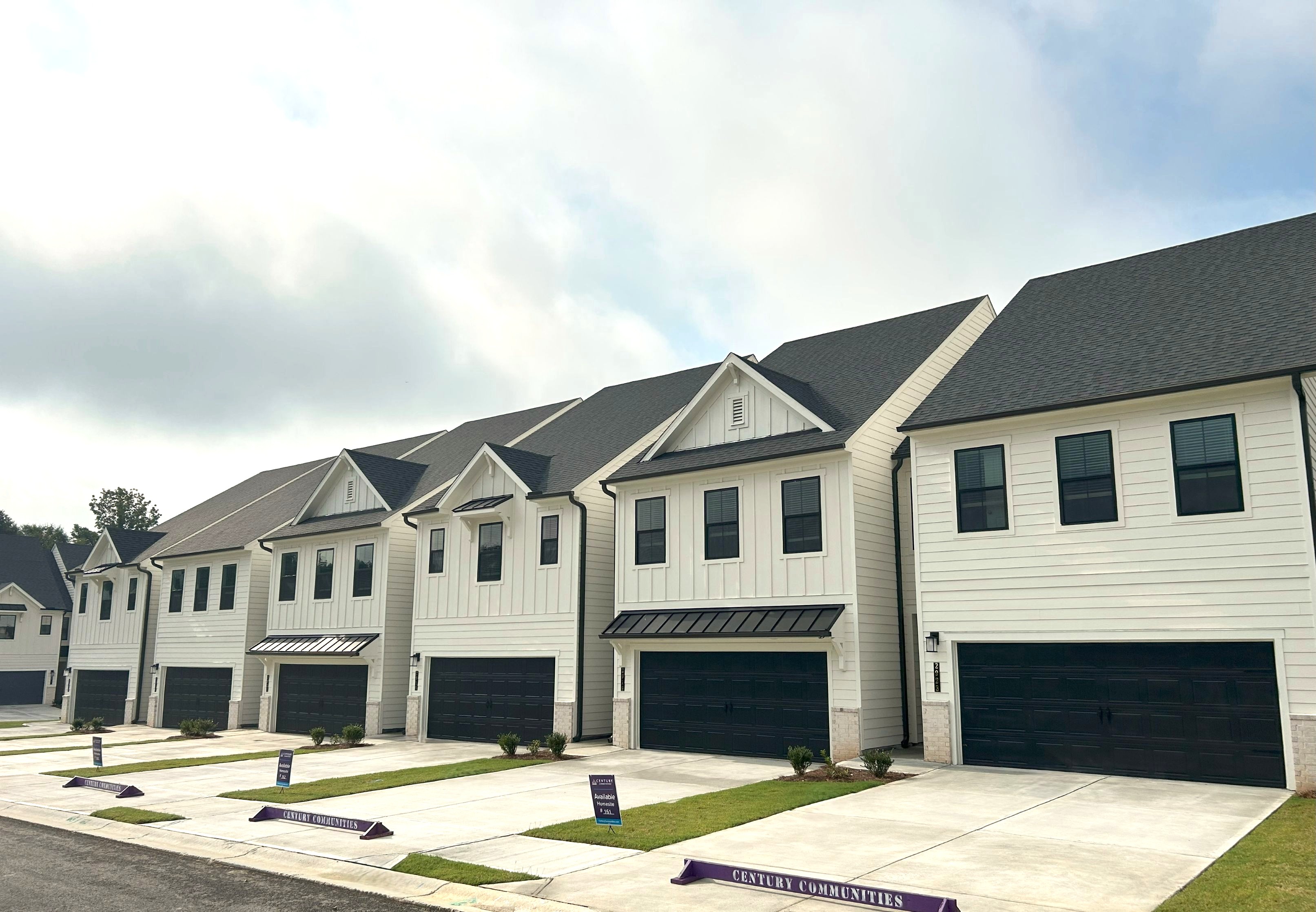 A large house with garages.