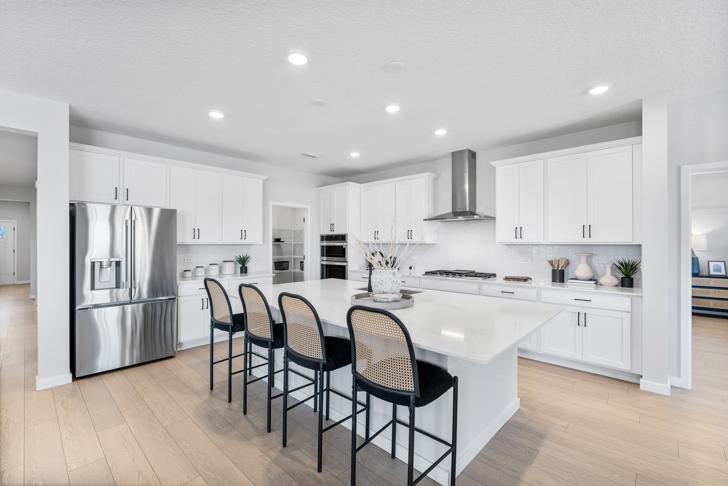 Kenai Model Home Chef's Kitchen with LG Appliances at Reserve East