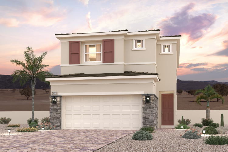 A white house with a driveway.