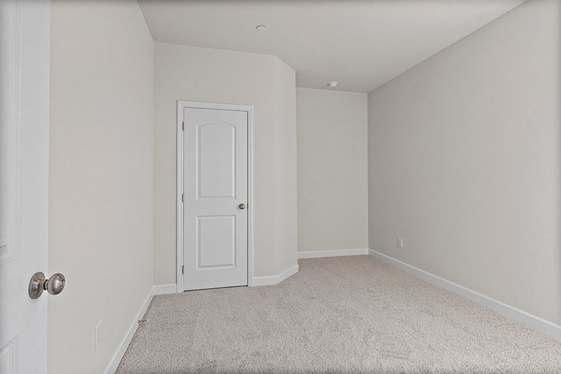 A room with white doors.