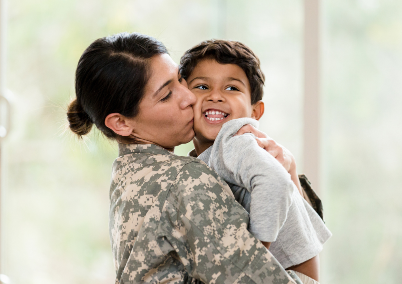 A person holding a child.