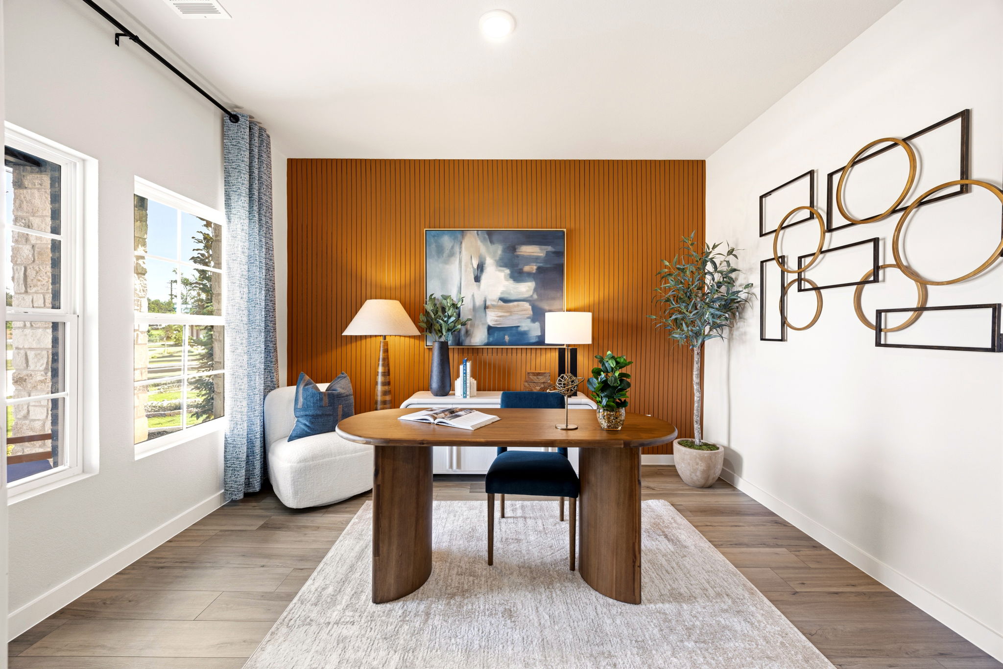 A room with a table and chairs.