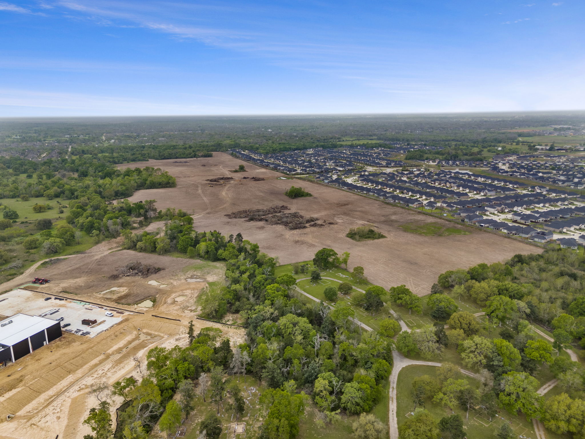 A landscape with trees and buildings.
