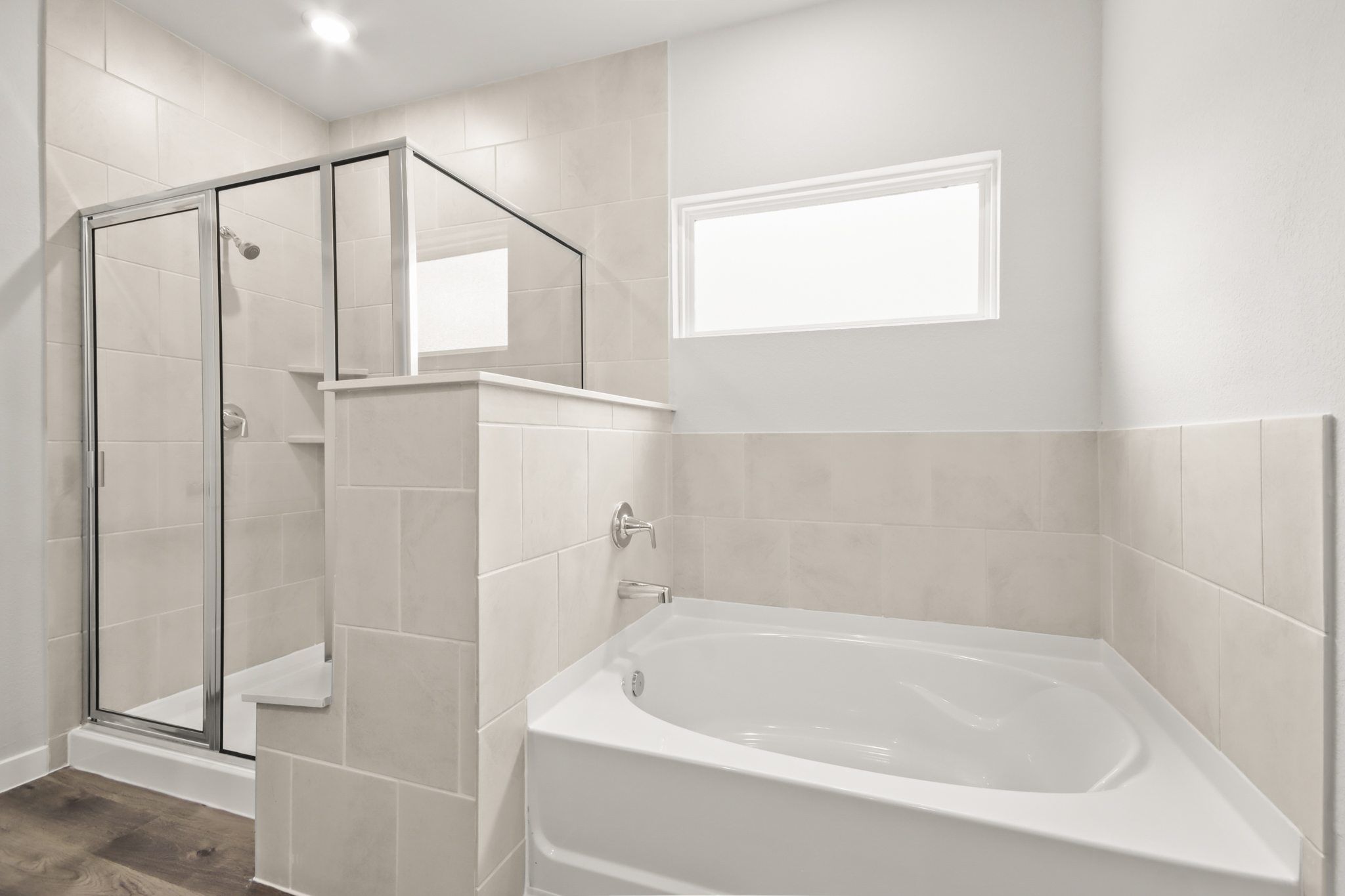 A bathroom with a glass shower.