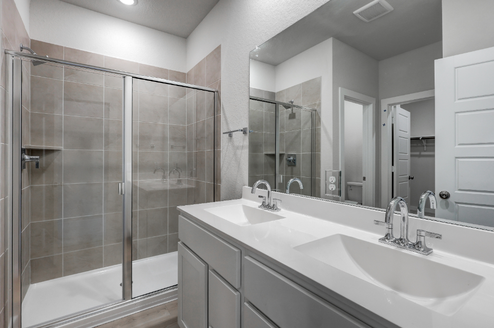A bathroom with a glass shower.