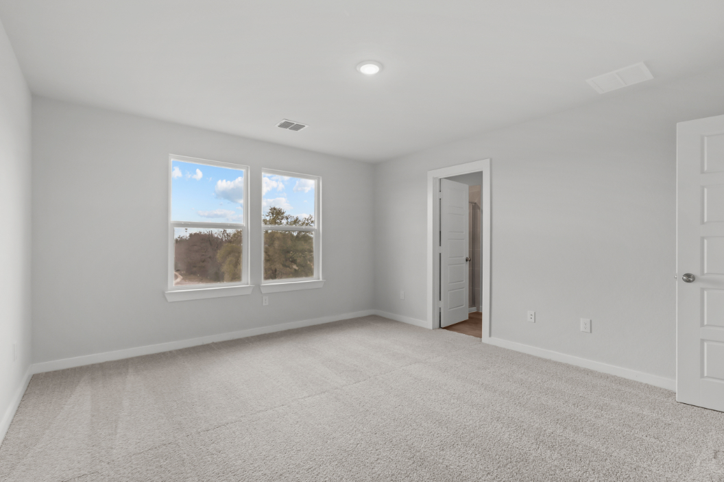 A room with a large window.