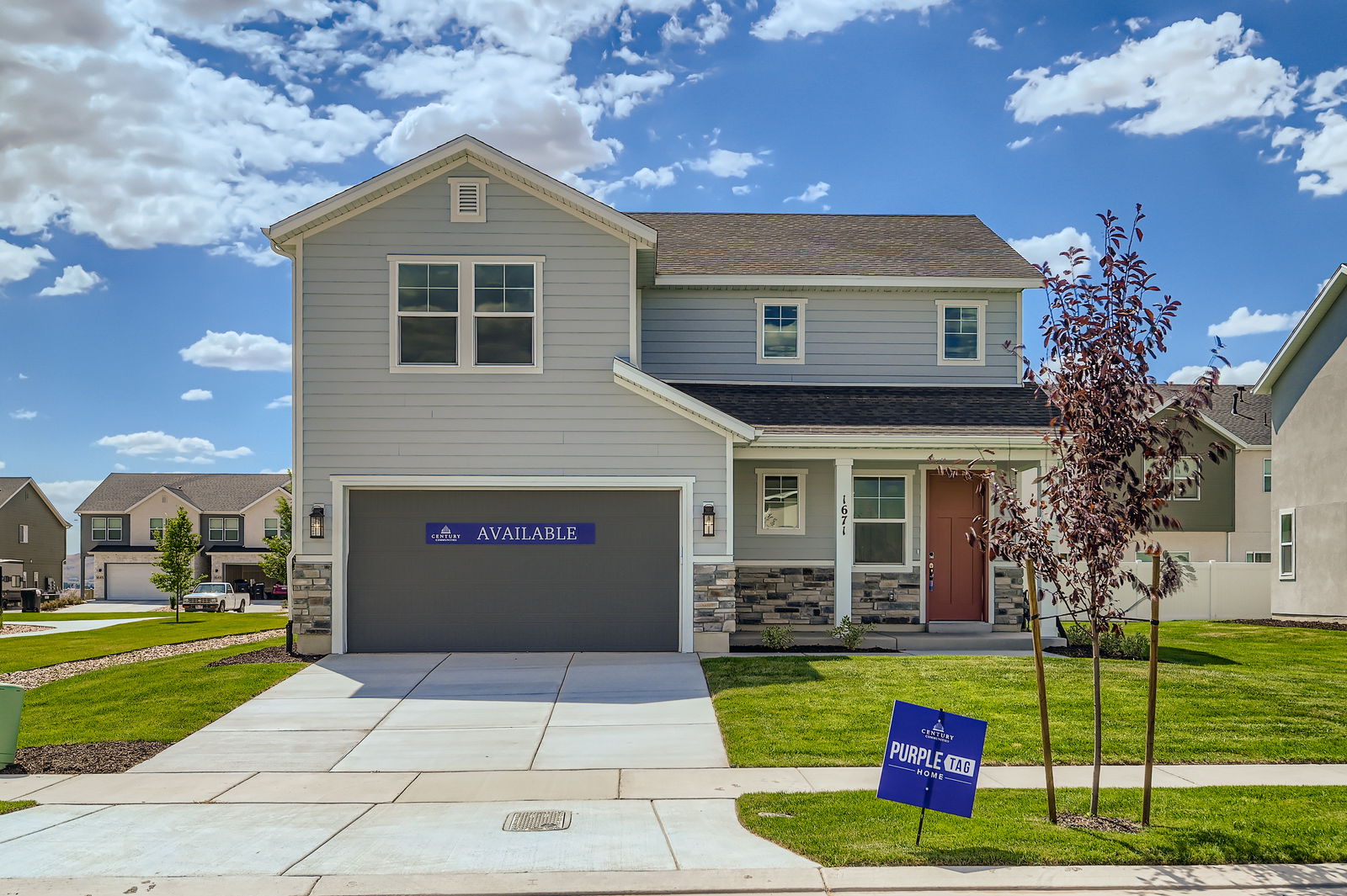 A building with a sign in front.