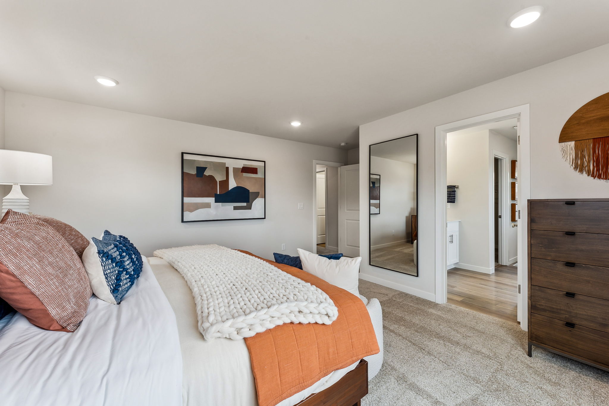 A bedroom with two beds.