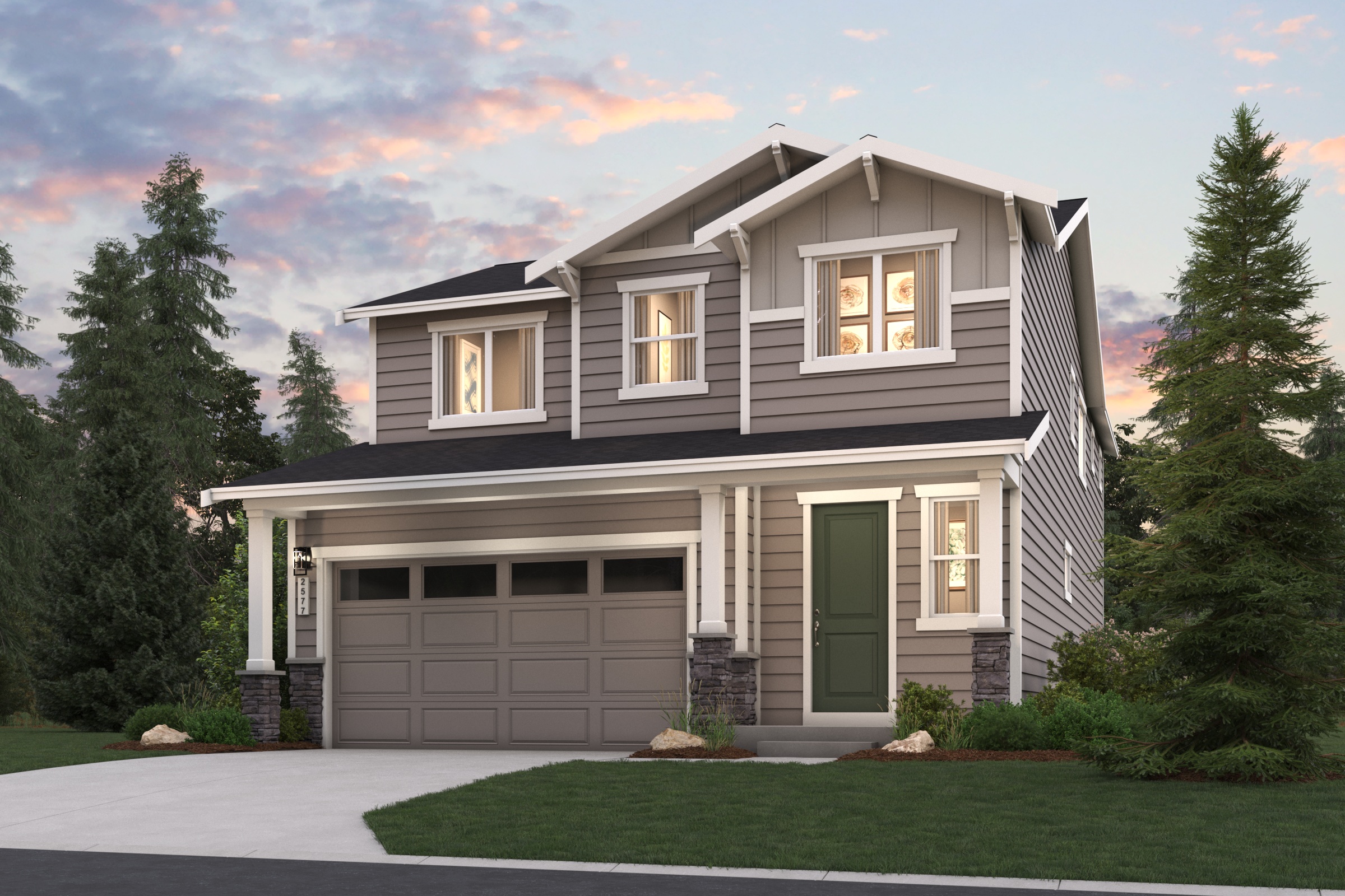 A house with a garage and trees around it.