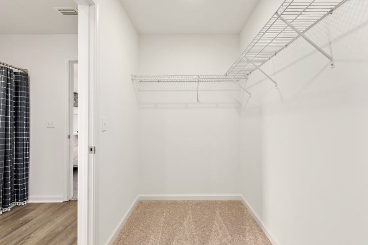 A hallway with white walls.